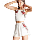Set with embroidered crop top and floral shorts