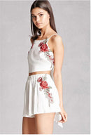 Set with embroidered crop top and floral shorts